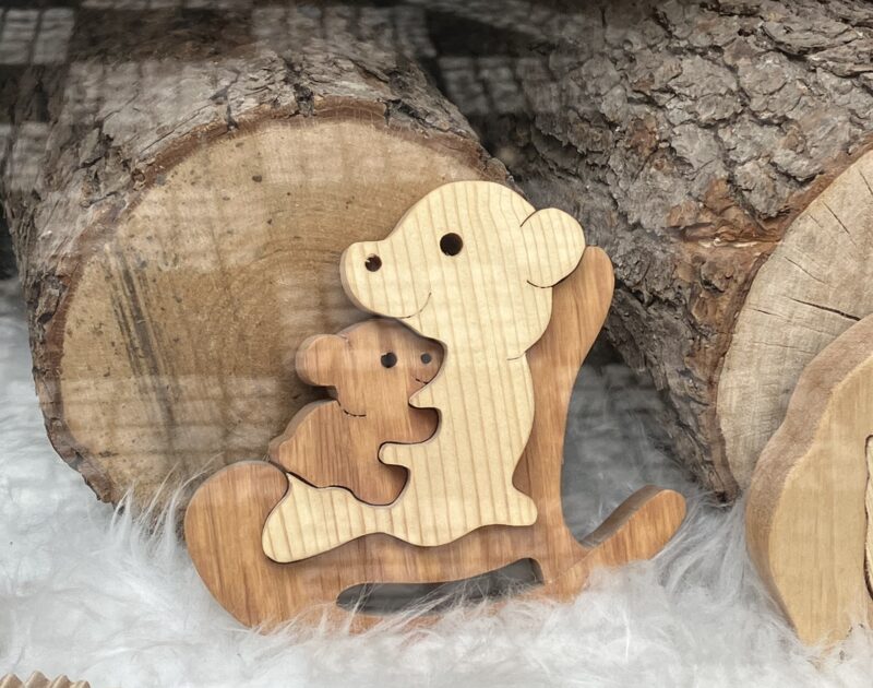wooden childrens jigsaw of a bear and cub hugging